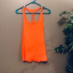 Under Armour neon orange fitness tank
